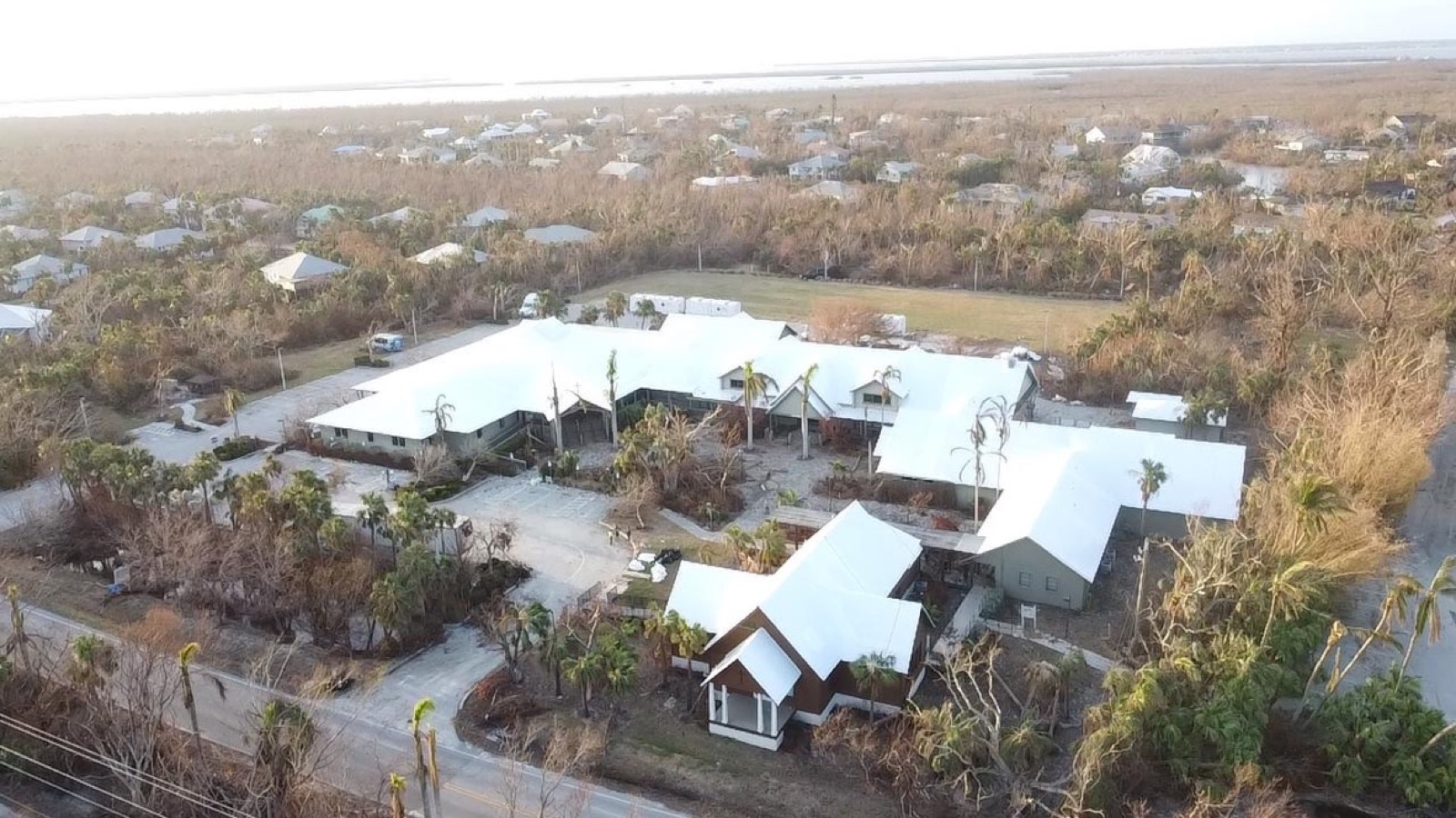 Disaster recovery roof protection across an island campus after a hurricane