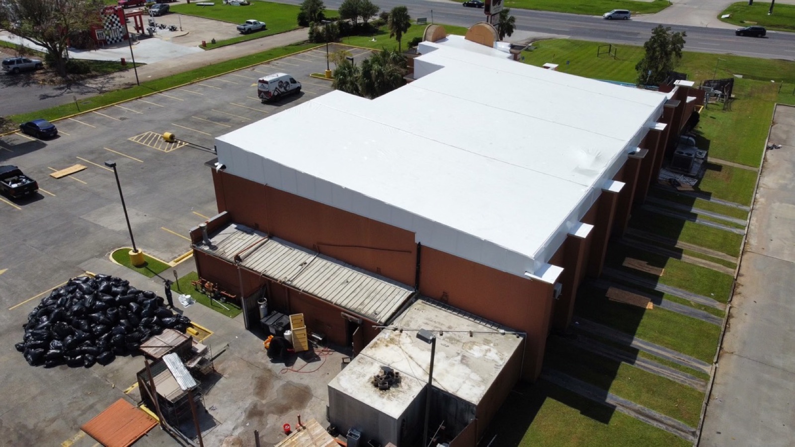 The same restaurant sealed under a white Titanium Tarps shrink wrap roof