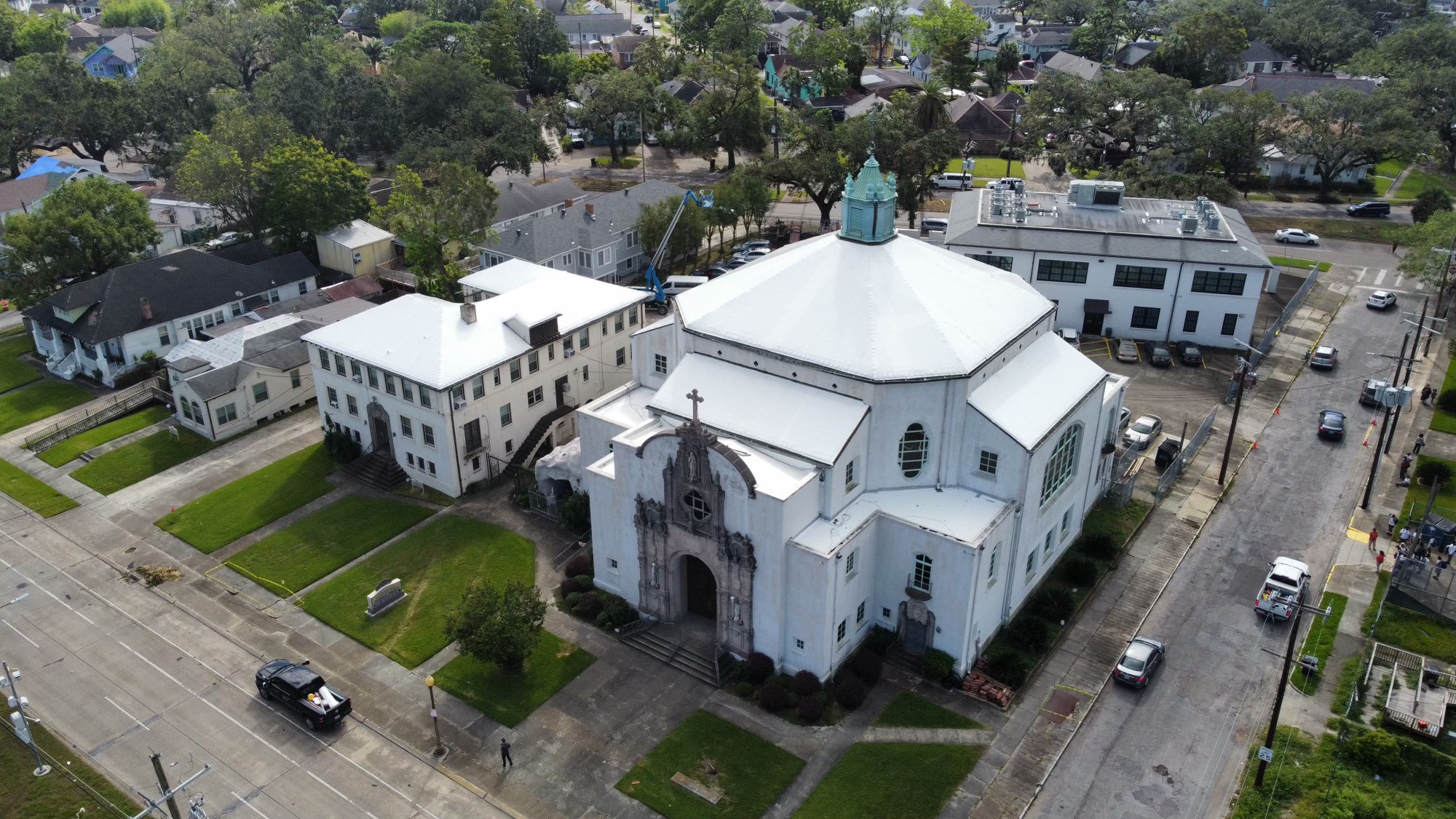 St. Leo church with a white Elastowrap sealed roof