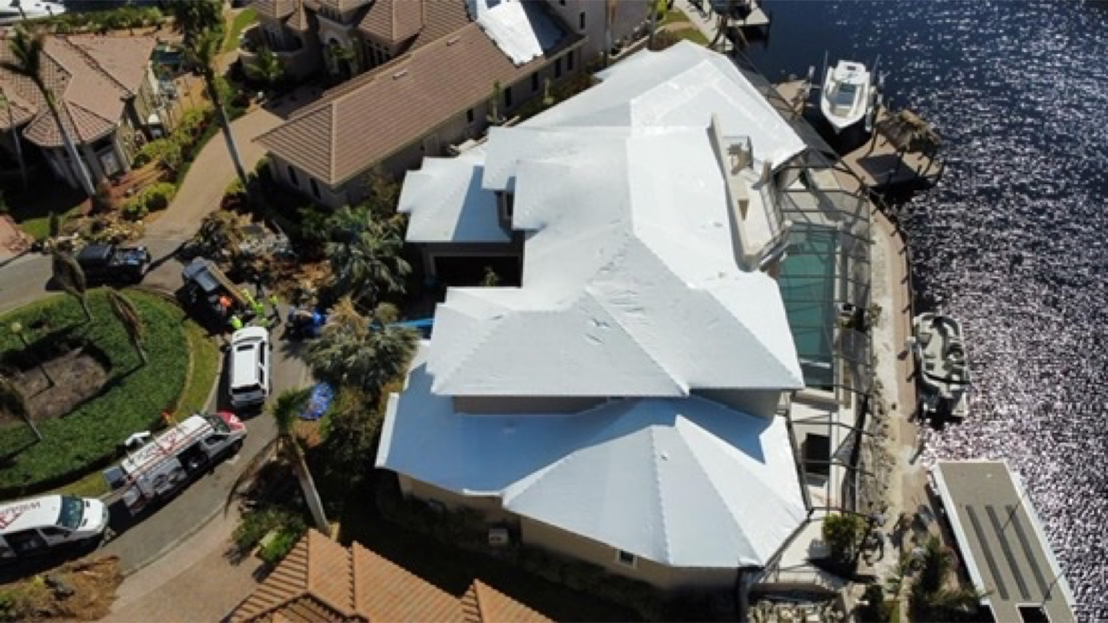 Shrink wrap roofing installed on a waterfront home
